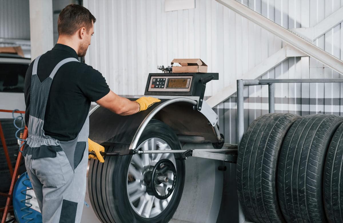 fixing the tire man in uniform is working in the 2023 11 27 04 55 09 utc(2)