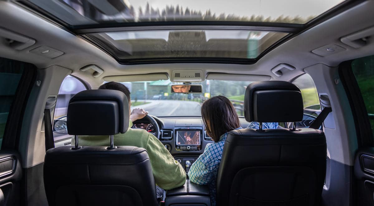 man and woman traveling in car sitting in car dri 2024 06 13 15 27 36 utc(1)