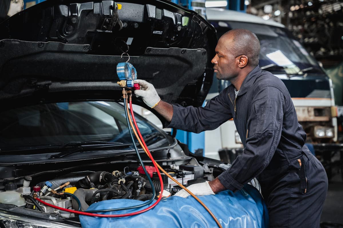 mechanics examine and inspect the refrigerant befo 2023 11 27 04 59 58 utc(1)