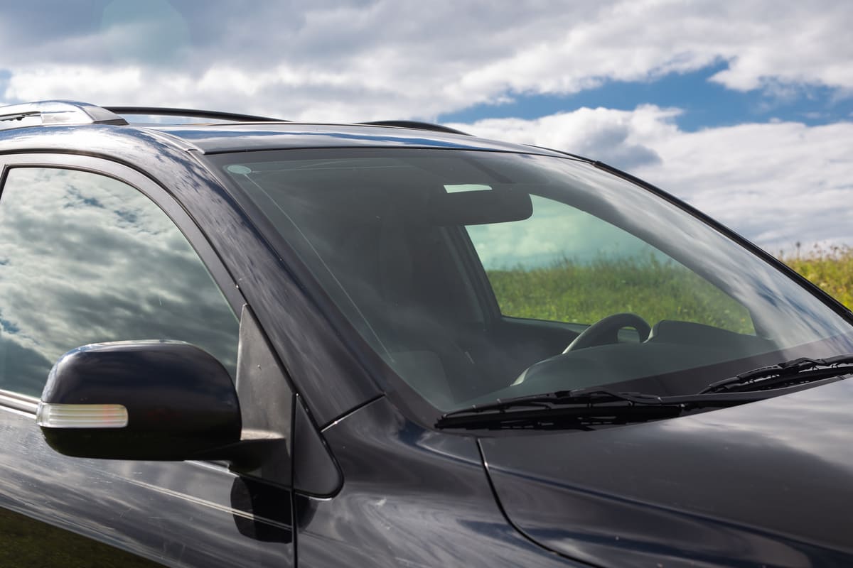 side rear view mirror on a modern black car outdoo 2023 11 27 05 17 51 utc(1)