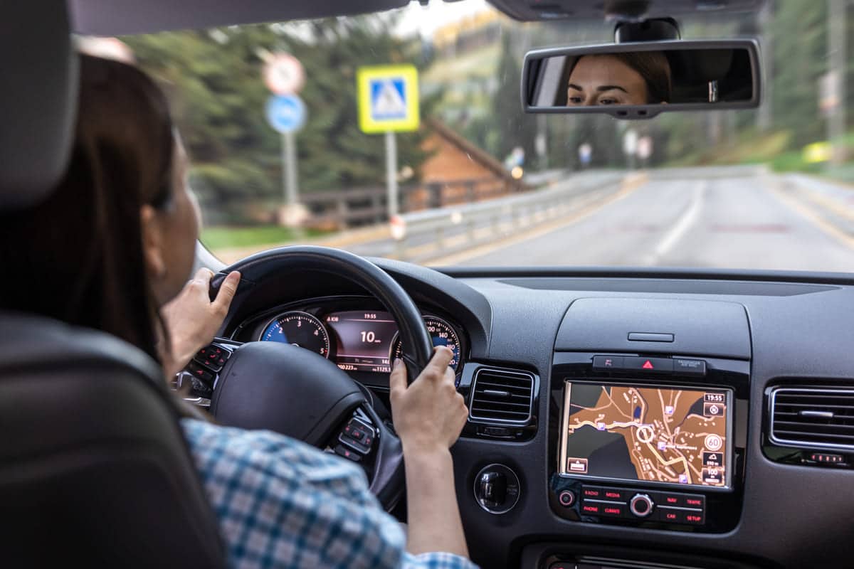 woman driving a car hands on the wheel close up 2024 07 10 18 56 41 utc(1)