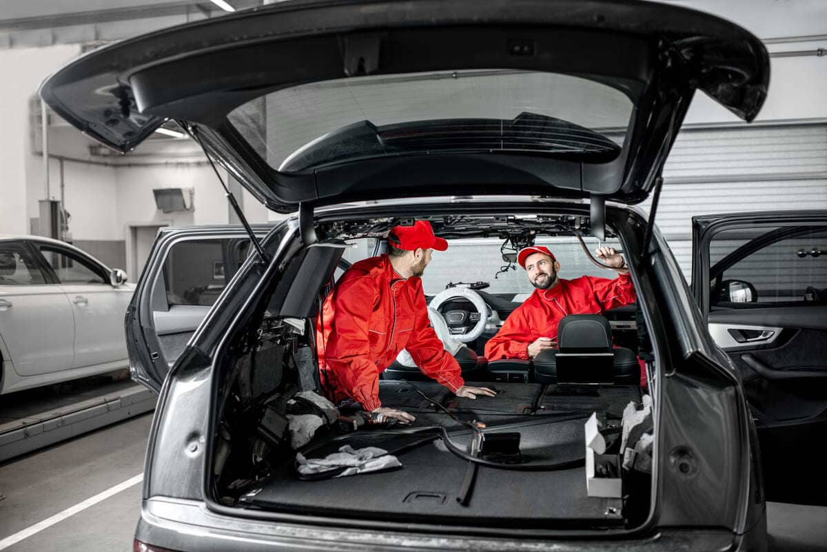 car service workers disassembling car interior 2023 11 27 05 19 33 utc(1)