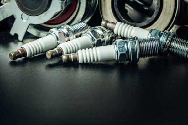 car spark plugs on black background close up 2023 11 27 05 08 02 utc(1)