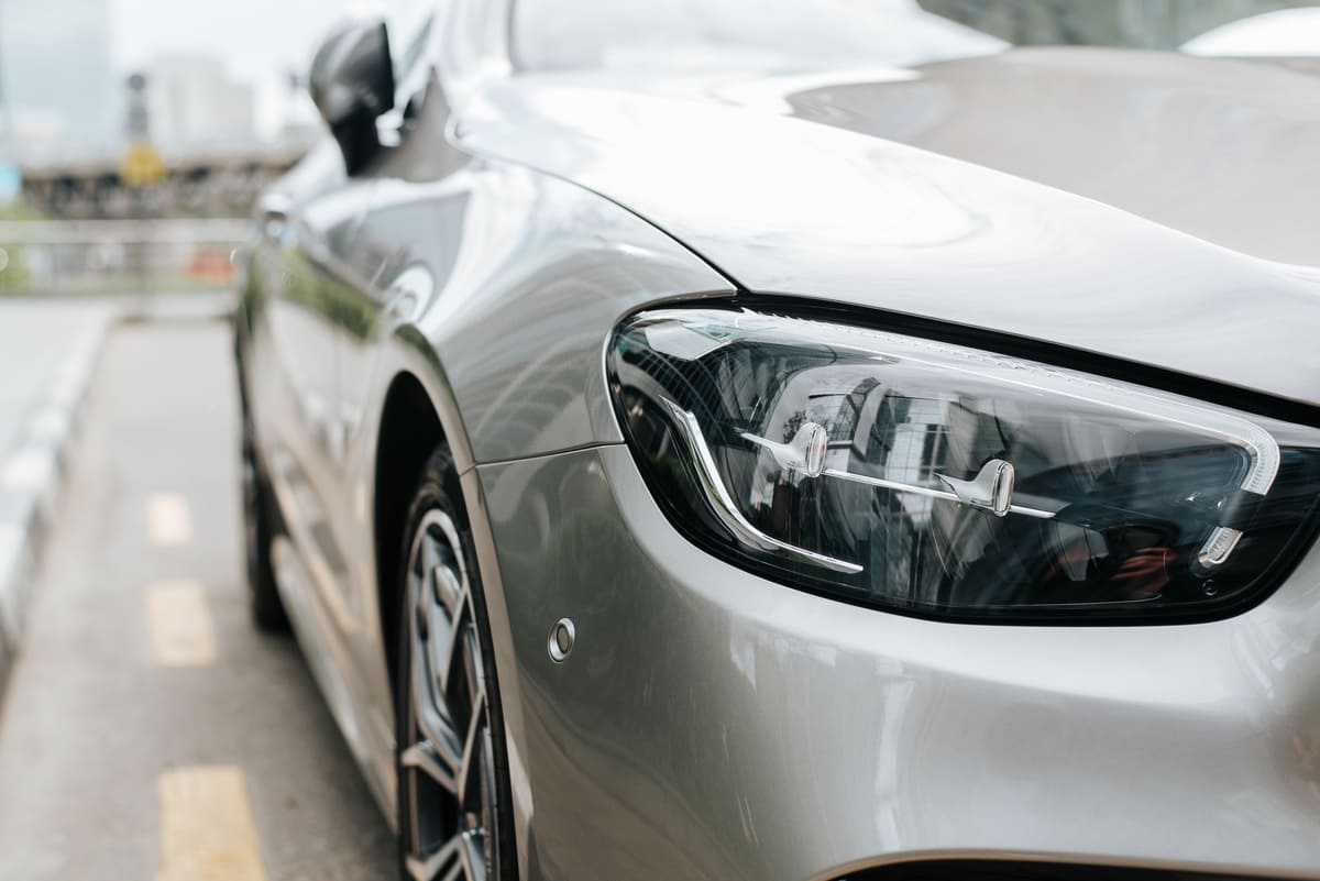 close up of stylish gray car luxury front headligh 2024 01 11 19 15 10 utc(1)