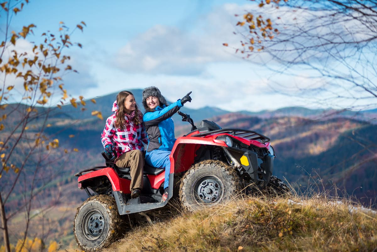 two female riders atv on a snow covered trail at s 2023 11 27 05 27 05 utc(1)