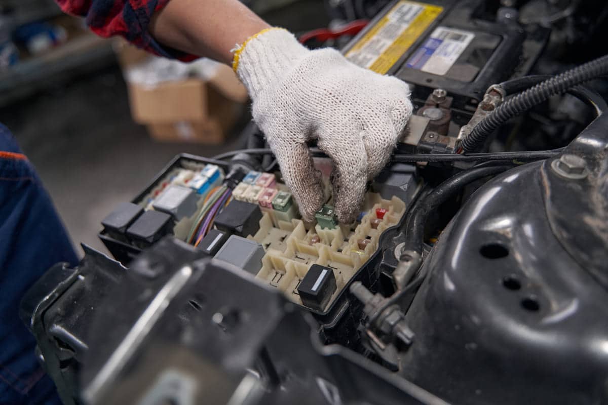 female auto mechanic checking car parts in auto re 2023 11 27 05 21 11 utc(1)