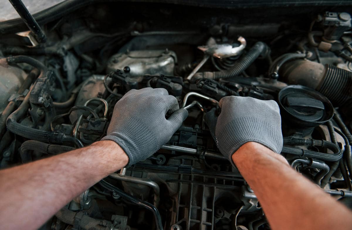 first person view of man s hands that repairs auto 2023 11 27 05 30 19 utc(1)