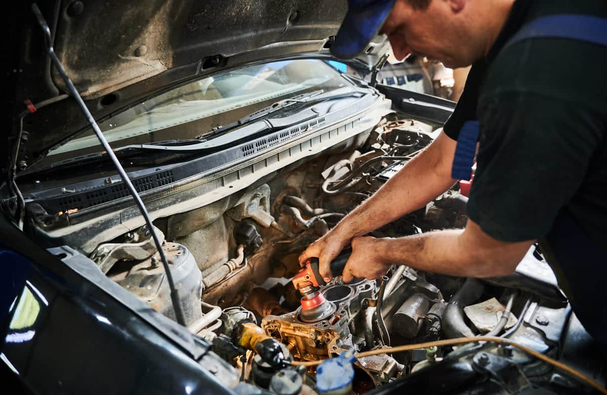 worker repairman mechanic wearing cap and unifor 2023 11 27 04 55 37 utc(1)